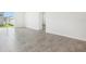 Open-concept living area featuring tile flooring and natural light at 3539 Moscato Dr, Brooksville, FL 34602