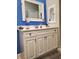 Bright bathroom featuring a modern vanity, stylish mirrors, and sleek fixtures at 1835 Rival Ter, North Port, FL 34286