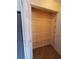 Storage closet featuring an organizer with metal shelves and tiled floor at 1835 Rival Ter, North Port, FL 34286