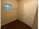 A small utility room has a window and wire shelving at 3805 N Cranberry Blvd, North Port, FL 34286