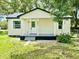 Charming single-story home featuring a covered front porch and well-maintained yard at 38706 8Th Ave, Zephyrhills, FL 33542