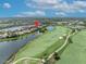 Picturesque aerial view of the property beside the golf course at 5531 Arnie Loop, Bradenton, FL 34211