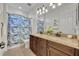 Bathroom featuring double sinks, granite countertops, and modern fixtures at 5531 Arnie Loop, Bradenton, FL 34211
