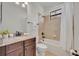 Cozy bathroom with a shower-tub combo and a granite countertop vanity at 5531 Arnie Loop, Bradenton, FL 34211