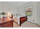 Cozy bedroom with a window letting in light and a dresser at 5531 Arnie Loop, Bradenton, FL 34211