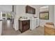 Well-equipped laundry room features a sink, cabinets, washer, dryer, and window at 5531 Arnie Loop, Bradenton, FL 34211