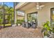 An outdoor dining area on a brick patio provides space for enjoying outdoor meals at 5531 Arnie Loop, Bradenton, FL 34211