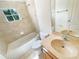 Cozy bathroom featuring tile flooring, a bathtub, and a vanity with sink at 10429 Avelar Ridge Dr, Riverview, FL 33578