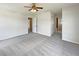 Spacious bedroom with soft carpet and ample closet space, perfect for relaxation at 10429 Avelar Ridge Dr, Riverview, FL 33578