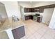 Well-appointed kitchen with granite countertops and stainless steel appliances at 10429 Avelar Ridge Dr, Riverview, FL 33578