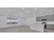 Bright kitchen featuring gray cabinets, stainless appliances, and island at 17322 Alderwood Ln, Punta Gorda, FL 33982