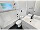 Bright bathroom with black hardware, subway tiles, and a modern vanity at 5001 S 88Th St, Tampa, FL 33619