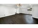 Large bedroom featuring hardwood floors, white walls, bright lighting and ceiling fan at 5001 S 88Th St, Tampa, FL 33619