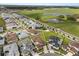 Experience serene community living, featuring picturesque landscaping, tranquil ponds, and private backyard swimming pools at 8297 Ivy Stark Blvd, Wesley Chapel, FL 33545