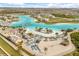 Discover a vibrant community featuring a sandy beach, clear blue water, and resort-style amenities at 8297 Ivy Stark Blvd, Wesley Chapel, FL 33545