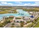Explore the vibrant community featuring a sandy beach, clear blue water, and resort-style amenities at 8297 Ivy Stark Blvd, Wesley Chapel, FL 33545