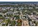 An aerial view shows the home's location amid the neighborhood with convenient access to nearby shops and roadways at 226 N Grosse Ave, Tarpon Springs, FL 34689