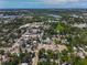 An aerial view showcasing the town's layout, with its proximity to water, buildings, and greenery at 226 N Grosse Ave, Tarpon Springs, FL 34689