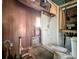 Bathroom featuring a shower with exposed pipes and walls, a rustic setup that could be renovated for a modern look at 226 N Grosse Ave, Tarpon Springs, FL 34689