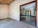 Interior view of a fixer upper home with damaged walls, flooring, ceiling, and doors at 226 N Grosse Ave, Tarpon Springs, FL 34689