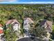 Panoramic aerial view showcasing lovely homes amidst lush greenery, capturing a serene and desirable neighborhood at 5009 Clover Mist Dr, Apollo Beach, FL 33572