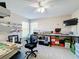 Bright bedroom with two desks and a nice view of the outdoor area at 5009 Clover Mist Dr, Apollo Beach, FL 33572
