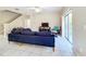 Bright living room with fan, slider doors, and stylish furniture at 5009 Clover Mist Dr, Apollo Beach, FL 33572