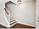 View of a light and bright stairway with dark treads at 609 S Glen Ave # E, Tampa, FL 33609