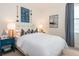 Nautical-themed bedroom featuring decor and a comfortable bed with white linens at 1079 Signet, Apollo Beach, FL 33572