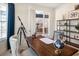 Home office with a wooden desk, comfortable seating, and natural light at 1079 Signet, Apollo Beach, FL 33572