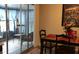 An inviting dining area features sliding glass doors leading to an enclosed outdoor space at 3680 Whiting Se Dr, St Petersburg, FL 33705