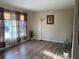 A spacious living room filled with natural light from the window at 3680 Whiting Se Dr, St Petersburg, FL 33705