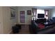Inviting living room featuring hardwood floors and a comfortable seating area at 3680 Whiting Se Dr, St Petersburg, FL 33705
