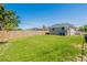 Spacious backyard with a privacy fence, offering a great outdoor space and lush green lawn at 3850 11Th S Ave, St Petersburg, FL 33711