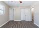 Spacious bedroom featuring wood-look flooring, neutral paint, and bright natural light at 3850 11Th S Ave, St Petersburg, FL 33711