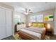 Bedroom featuring an updated ceiling fan and a closet at 3850 11Th S Ave, St Petersburg, FL 33711