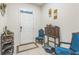 Inviting entryway featuring a front door with sidelight and elegant furniture at 819 Lucent Sands Ct, Brandon, FL 33511