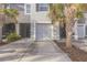 Charming townhome featuring well-maintained landscaping and a private garage at 819 Lucent Sands Ct, Brandon, FL 33511