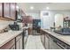 Well-equipped kitchen featuring modern appliances and ample counter space at 819 Lucent Sands Ct, Brandon, FL 33511