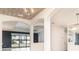 Bright foyer with white arches and views of the pool at 20323 Granlago Dr, Venice, FL 34293