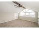 Bright upstairs bedroom with large windows, carpet flooring, and ample closet space at 1001 Meadowcrest Dr, Valrico, FL 33594