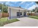 Spacious backyard with covered patio, providing an ideal outdoor retreat at 4413 W Wallcraft Ave, Tampa, FL 33611