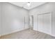 Bright bedroom with carpet, neutral walls and ensuite bath and double closet at 4413 W Wallcraft Ave, Tampa, FL 33611