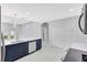 Modern kitchen with large island, and stainless steel appliances, open to living area at 4413 W Wallcraft Ave, Tampa, FL 33611