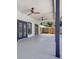 Covered patio with two ceiling fans and two sets of french doors at 4413 W Wallcraft Ave, Tampa, FL 33611