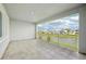 Spacious balcony featuring tile floors, modern railing and a view of the community at 9201 Sanders Tree Loop, Wesley Chapel, FL 33545