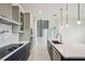 Modern kitchen features sleek countertops, stainless steel appliances, and stylish cabinetry at 9201 Sanders Tree Loop, Wesley Chapel, FL 33545