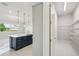 Convenient walk-in pantry with ample shelving offers plenty of storage space in the kitchen area at 9201 Sanders Tree Loop, Wesley Chapel, FL 33545