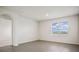 Bedroom features neutral paint, large window, and views of the lake at 17127 Harvest Moon Way, Bradenton, FL 34211