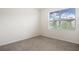 Bedroom with neutral walls and carpet at 17127 Harvest Moon Way, Bradenton, FL 34211